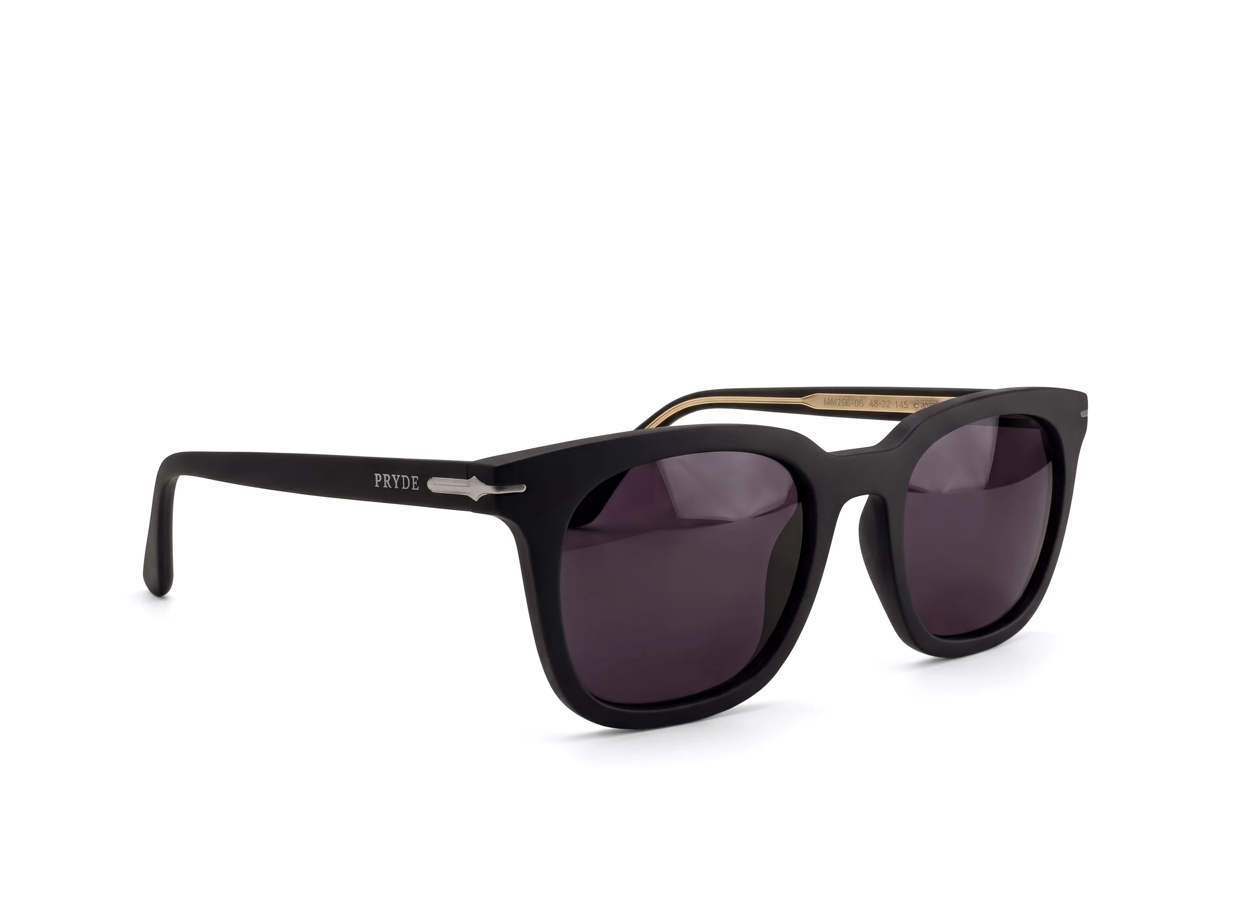 PRYDE ARC — polished gold and clear crystal acetate optical frame with geometric bridge, front view on white background.